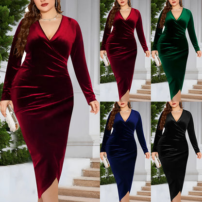 A woman wearing a red plus size V-neck dress with long sleeves.