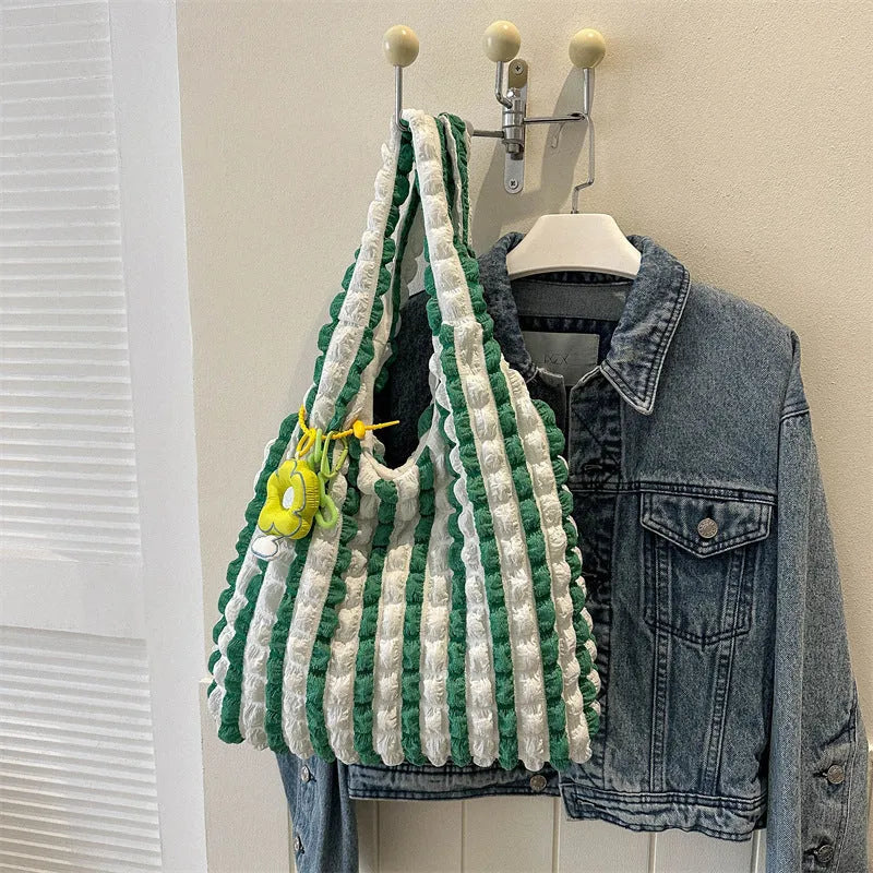 Women's pleated bubble crossbody bag in vertical square shape with pendant accessory