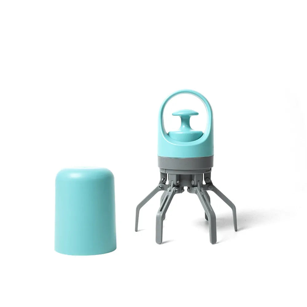 Blue portable claw-style dog pooper scooper with a roll of disposable bags for outdoor pet waste clean-up.