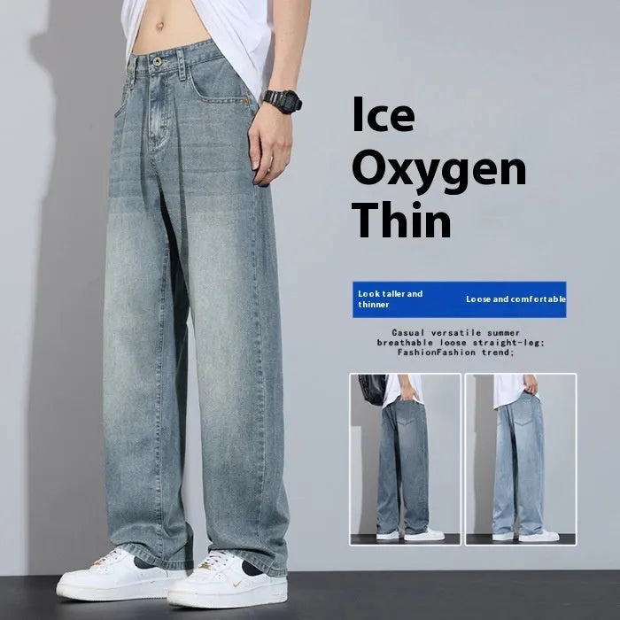 Straight-leg casual trousers in thin denim fabric with zip fly placket, available in UK2560 blue, grey, light blue, and vintage blue colours