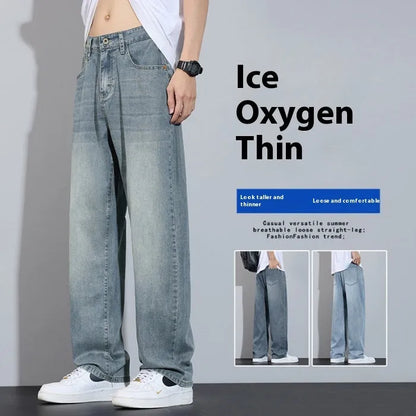Straight-leg casual trousers in thin denim fabric with zip fly placket, available in UK2560 blue, grey, light blue, and vintage blue colours