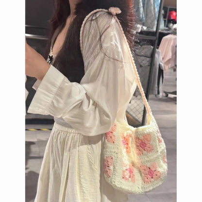 Handmade cotton crochet handbag with cherry blossom pattern and magnetic buckle closure