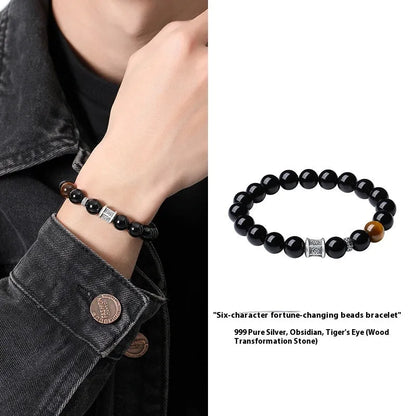 Men's black obsidian prayer wheel bracelet with hand-woven construction and 10mm beads