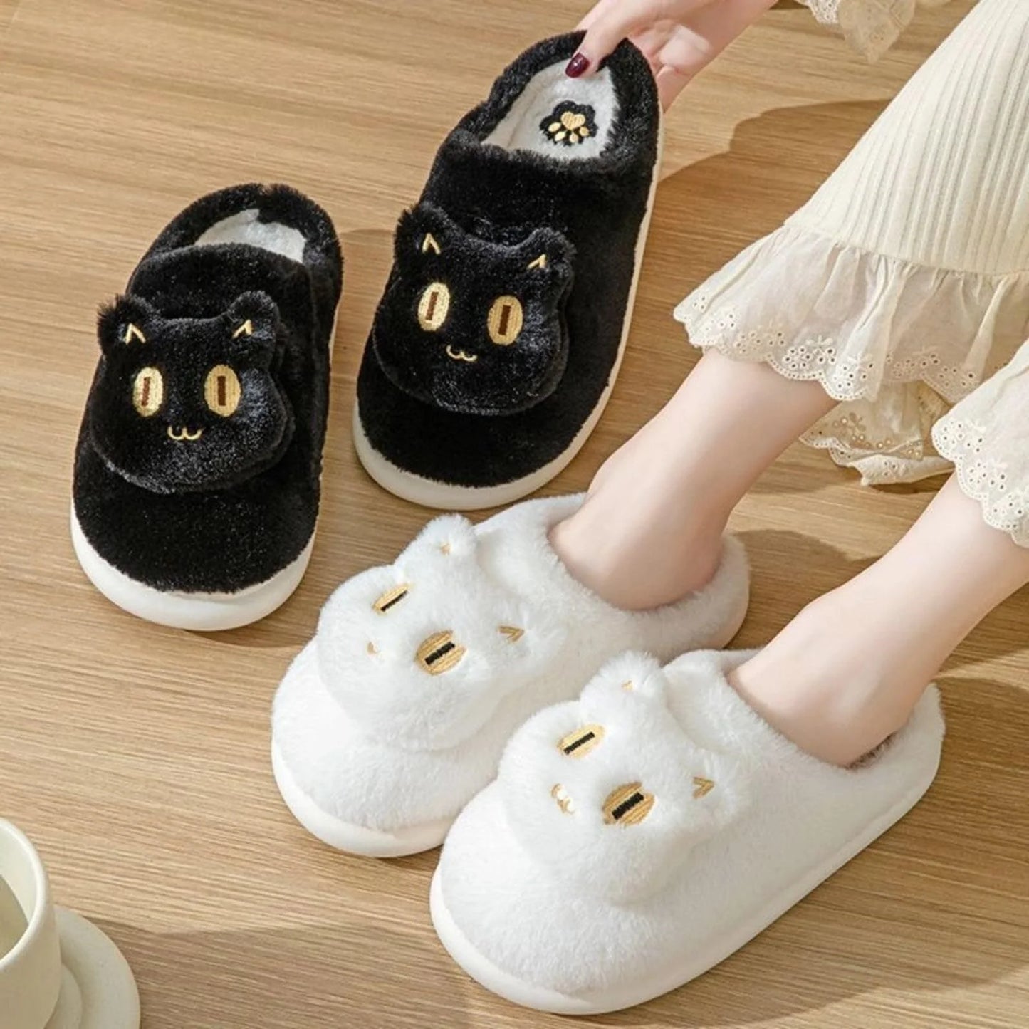 Cozy cat-themed plush slippers with soft, plush fabric and memory foam insoles for comfortable all-day wear