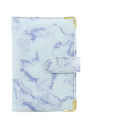 A6 leather PU binder journal open showing colour budget sheets and zip pockets with spiral binding