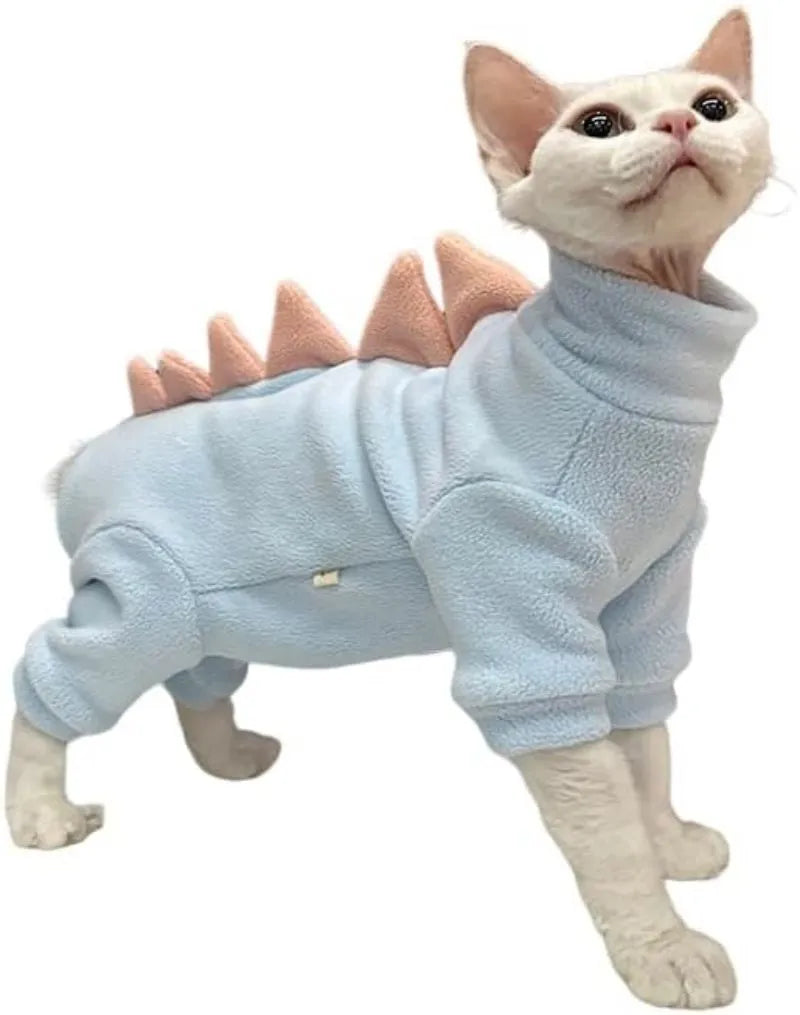 Dinosaur costume on hairless Sphynx cat showing fleece material and decorative spikes