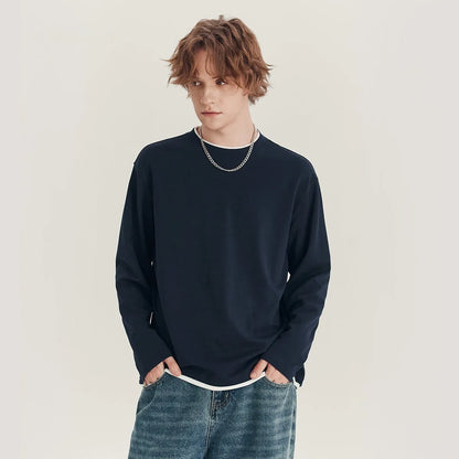 Men's loose fit long-sleeved cotton blend t-shirt in solid colour on hanger