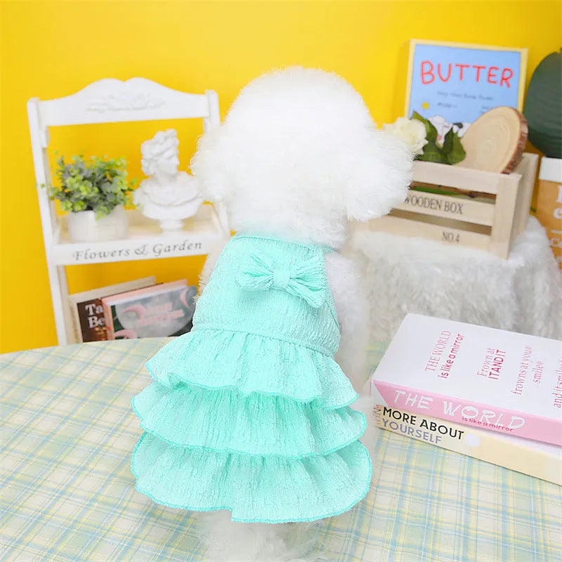 Small dog wearing polyester princess dress with layered skirt in rose red colour
