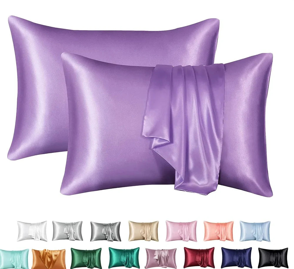 Silk-effect satin envelope pillowcase in navy blue showing envelope closure and smooth fabric texture