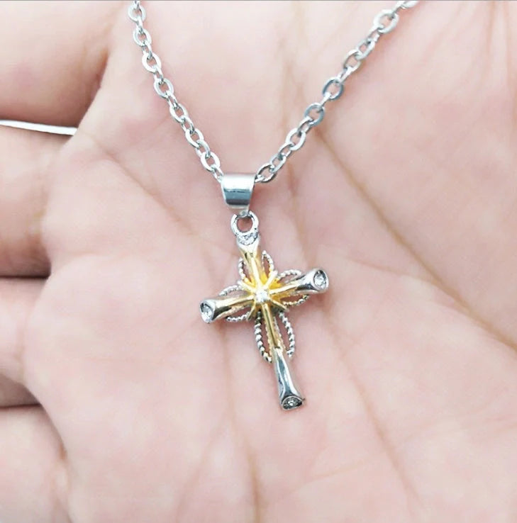 Octagonal star-shaped silver cross pendant necklace with an adjustable chain, a versatile and stylish accessory for women