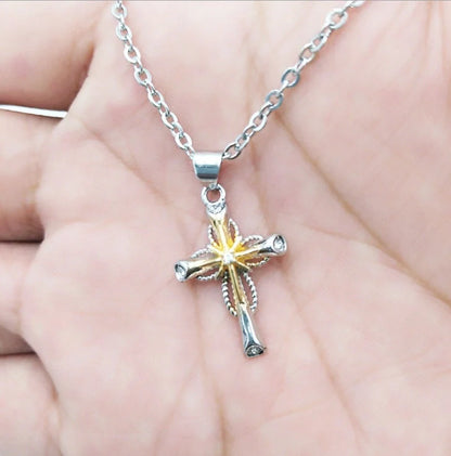 Octagonal star-shaped silver cross pendant necklace with an adjustable chain, a versatile and stylish accessory for women