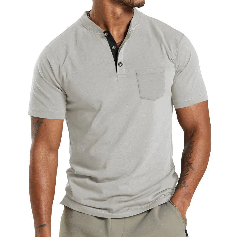 A man wearing a plus size solid colour short sleeve polyester shirt with a button chest pocket.