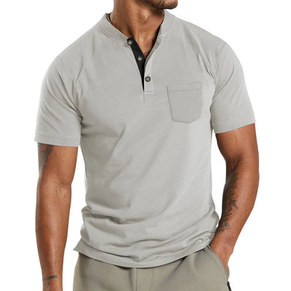 A man wearing a plus size solid colour short sleeve polyester shirt with a button chest pocket.