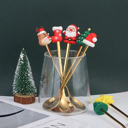 Red stainless steel Christmas spoons and forks with decorative snowman and Christmas tree handles