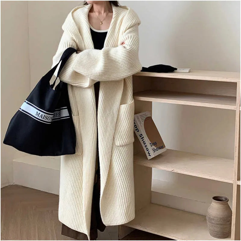 Loose hooded women's cardigan with raglan sleeves in milky white colour showing extended 80cm length