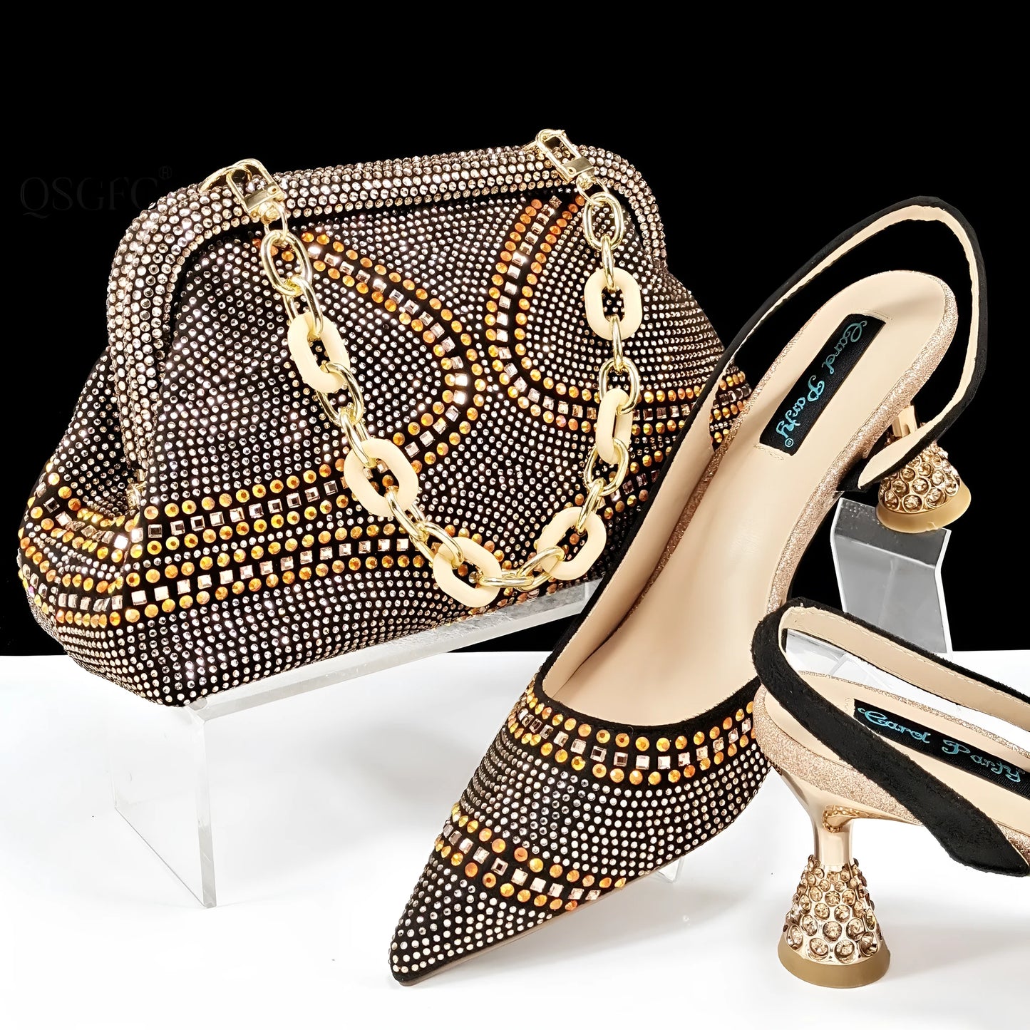 Women's pointed toe high heel court shoes in blue with rhinestone detail and a matching small bag.