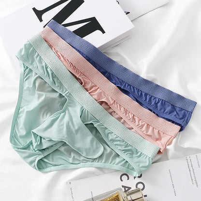 Men's low waist briefs in ice silk fabric, showing knitted weave and low waist design, available in black, gray, light green, pink, purplish blue.