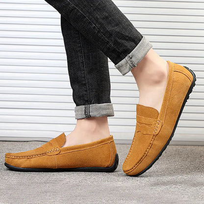 Men's suede loafers in black, blue, dark blue, wine red, and yellow colours with round toe and slip-on design.