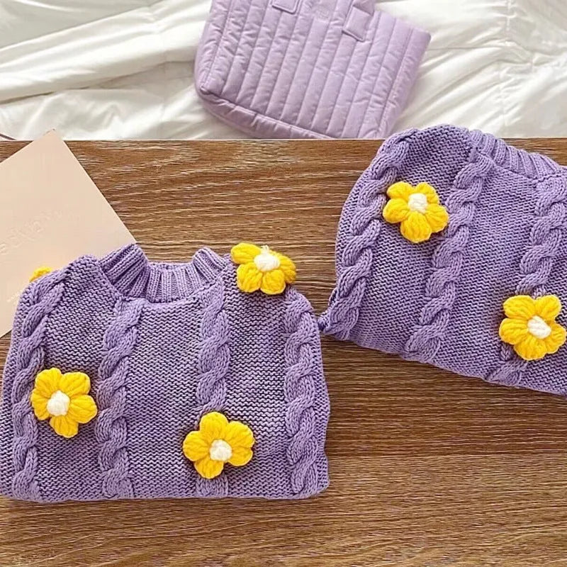 Purple floral print knitted dog jumper shown in size L with 35cm back length for dogs 4.00kg-5.00kg