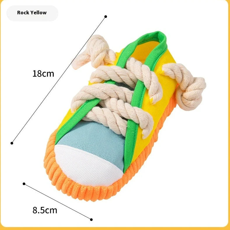 15cm plastic dog chew toy with textured surface and squeaking feature in three colour options