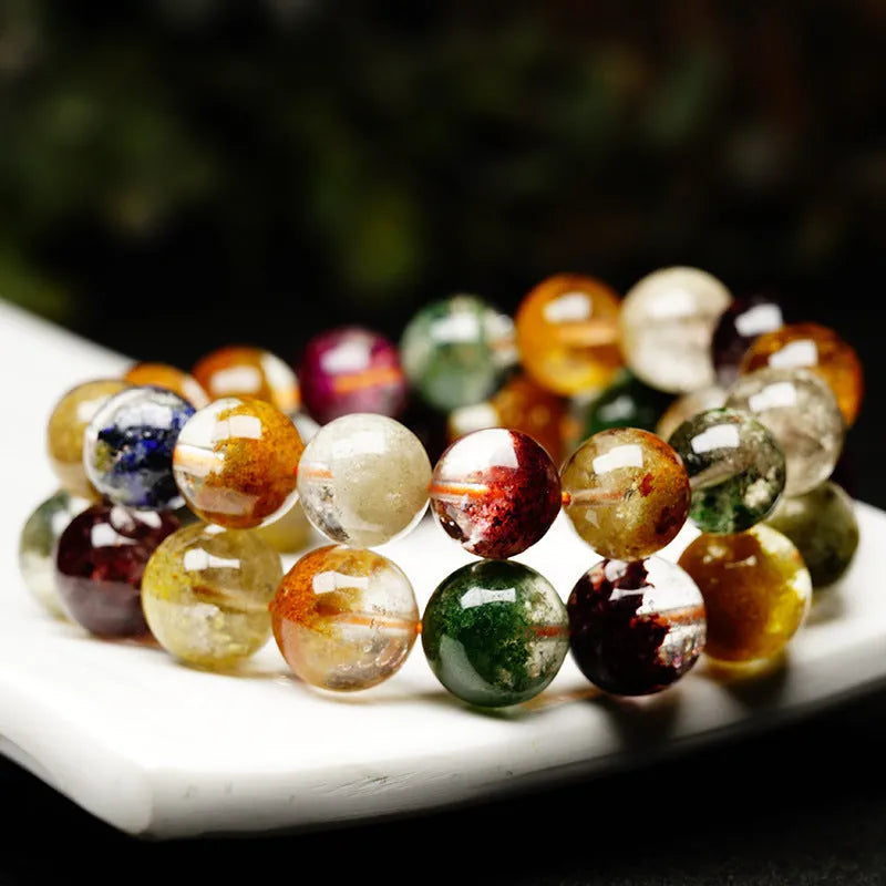 Colourful ghost cornucopia design bracelet made with 10mm crystal beads in a retro ethnic ball bracelet style.