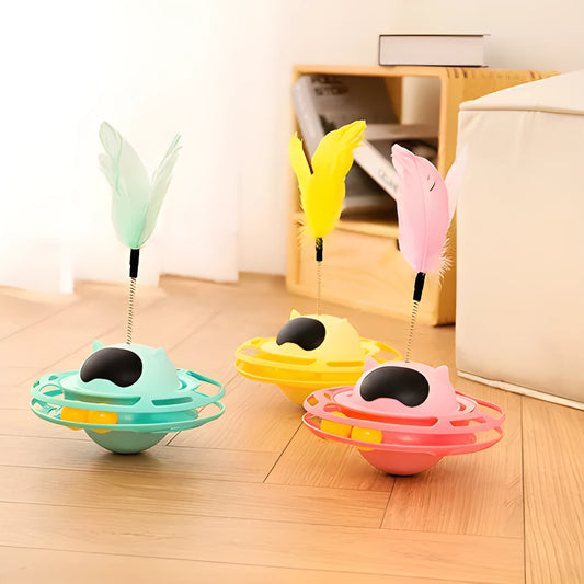 Pink cat tumbler turntable toy for self-play, measuring 17cm by 10cm.