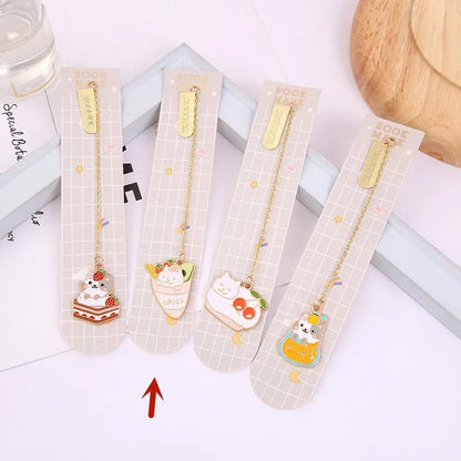 Jane Lime Foodie cat creative metal bookmark with cartoon pendant on a book page.