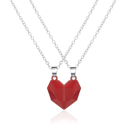 Elegant magnetic couple heart pendant necklace in various colors, featuring a unique magnetic design and premium gold-plated materials