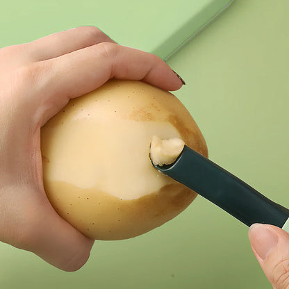 Stainless steel vegetable peeler with PP handle in aquamarine colour showing blade and grater functions