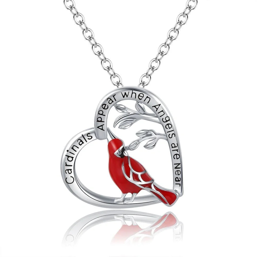 Elegant heart-shaped cardinal pendant necklace perfect for anniversaries and Valentine's Day gifts.