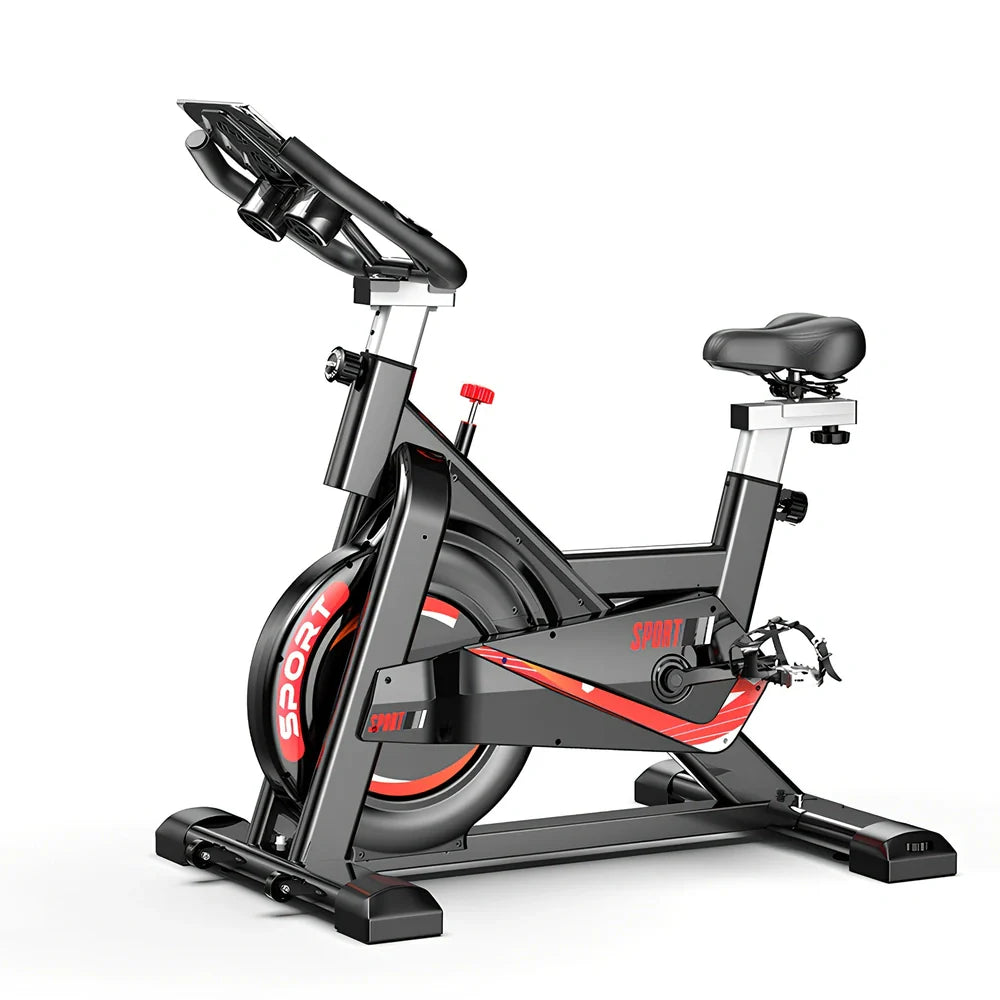 Black upright spinning bike with infinite resistance display for silent home fitness tracking distance and calories