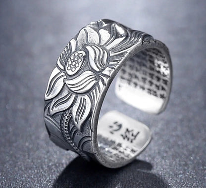 Handcrafted Thai sterling silver ring with intricate Heart Sutra engraving, promoting mental clarity and emotional balance.
