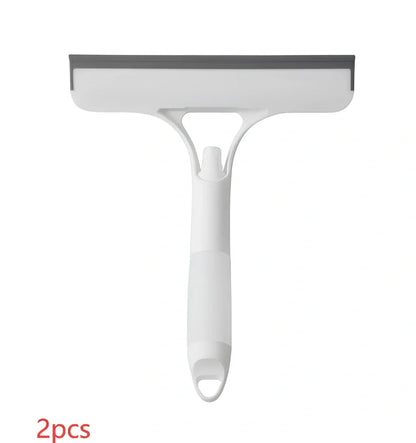 Double-sided plastic glass scraper in sky blue, 15cm long for removing household water stains