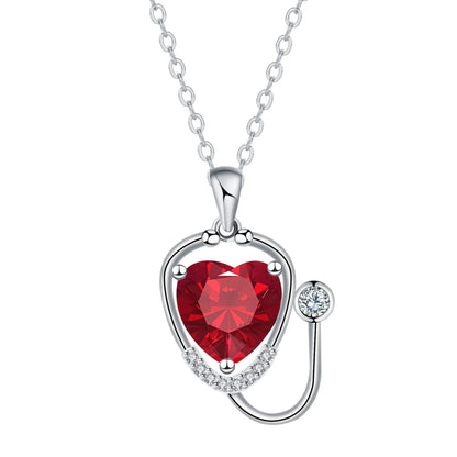Red diamond wings cross stethoscope pendant necklace on a copper chain.