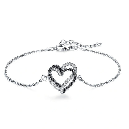 Black titanium steel heart bracelet for women, elegant and durable jewelry piece