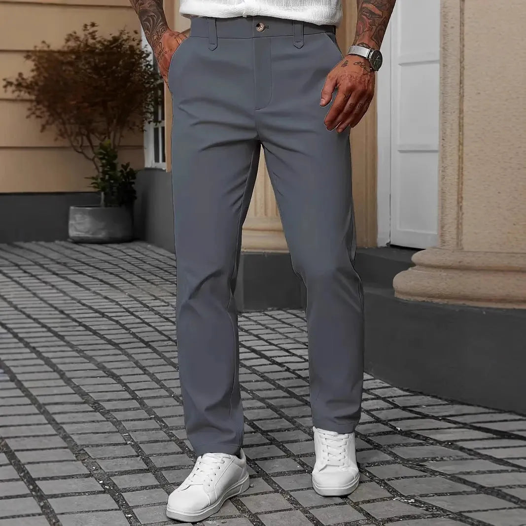 Men's straight leg business trousers in four colours: black, apricot, grey, and white.