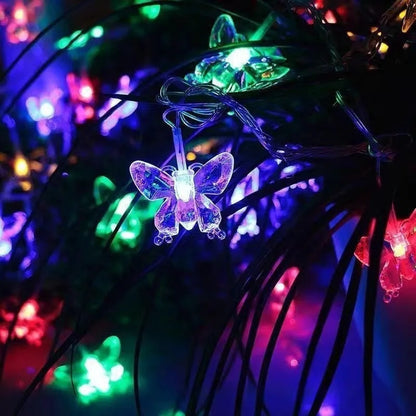 Solar butterfly dragonfly string lights in garden with IP65 protection, multiple lengths and warm or colour light options