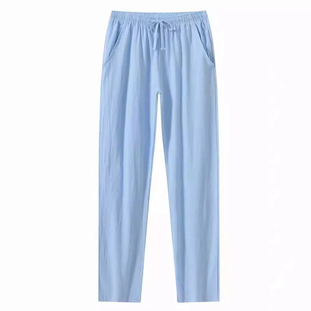 Men's cotton linen beach trousers in loose casual fit, shown in solid colour options