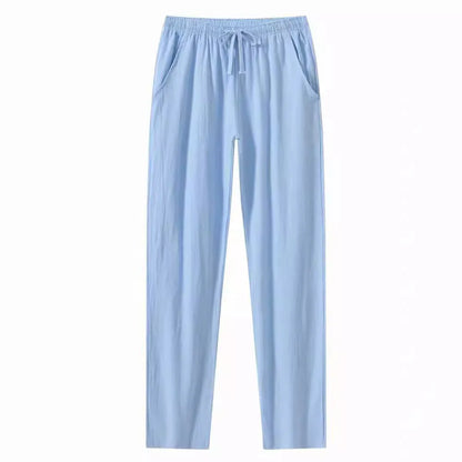 Men's cotton linen beach trousers in loose casual fit, shown in solid colour options