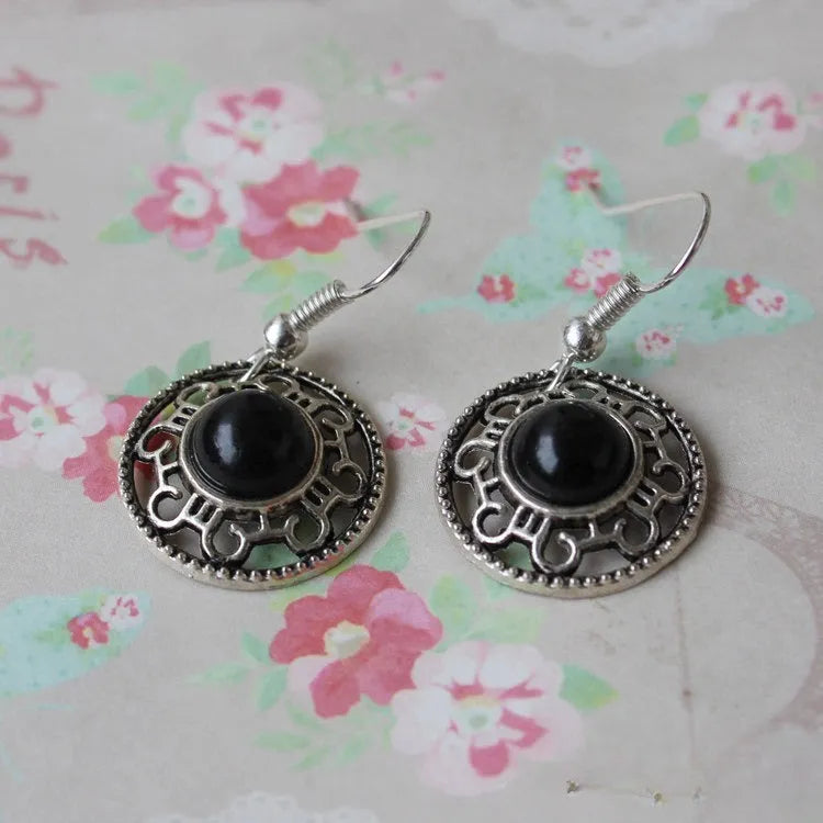 Handmade Miao silver retro turquoise flower disk earrings with geometric totem patterns