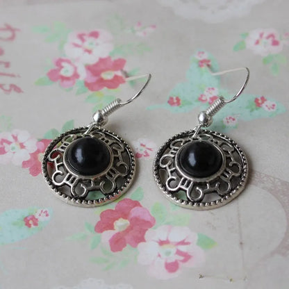 Handmade Miao silver retro turquoise flower disk earrings with geometric totem patterns