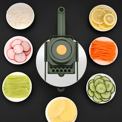 Grey and green vegetable slicer with five stainless steel blades and protective gauntlet