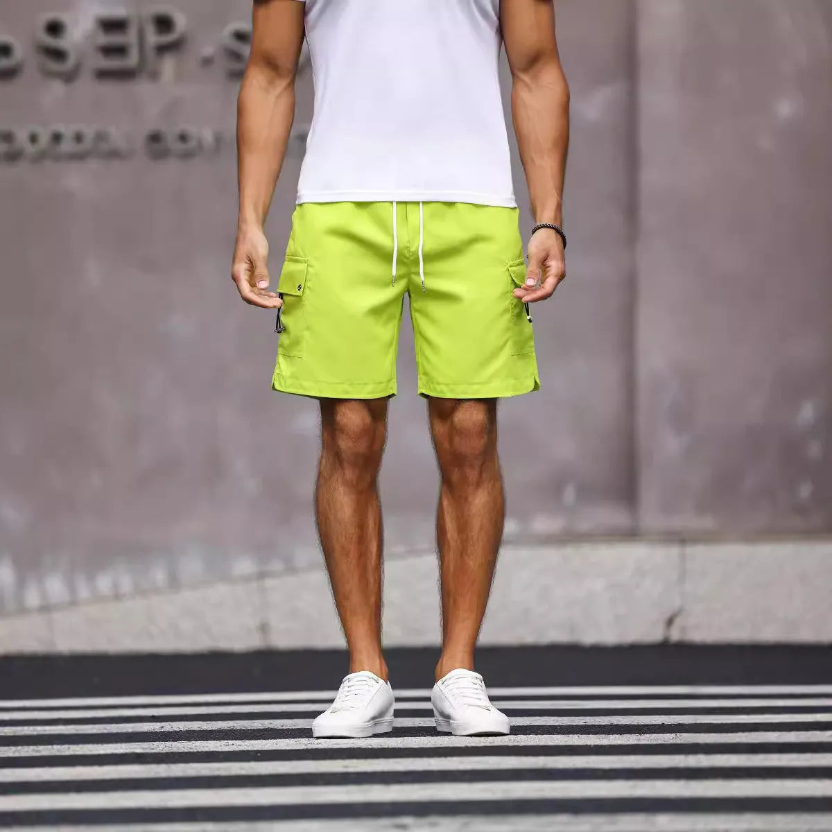 Men's loose straight leg workwear shorts in army green and fluorescent green colour options
