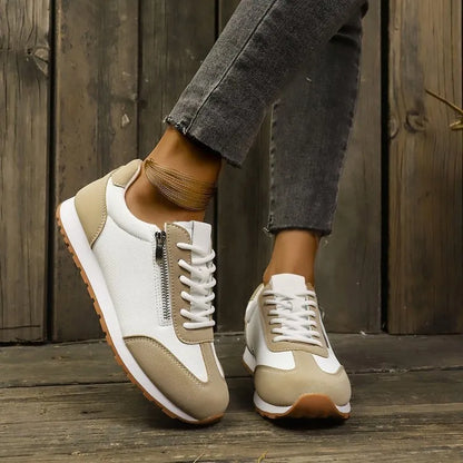 Women's flat-heeled shoe in champagne colour with artificial PU upper and rubber sole.