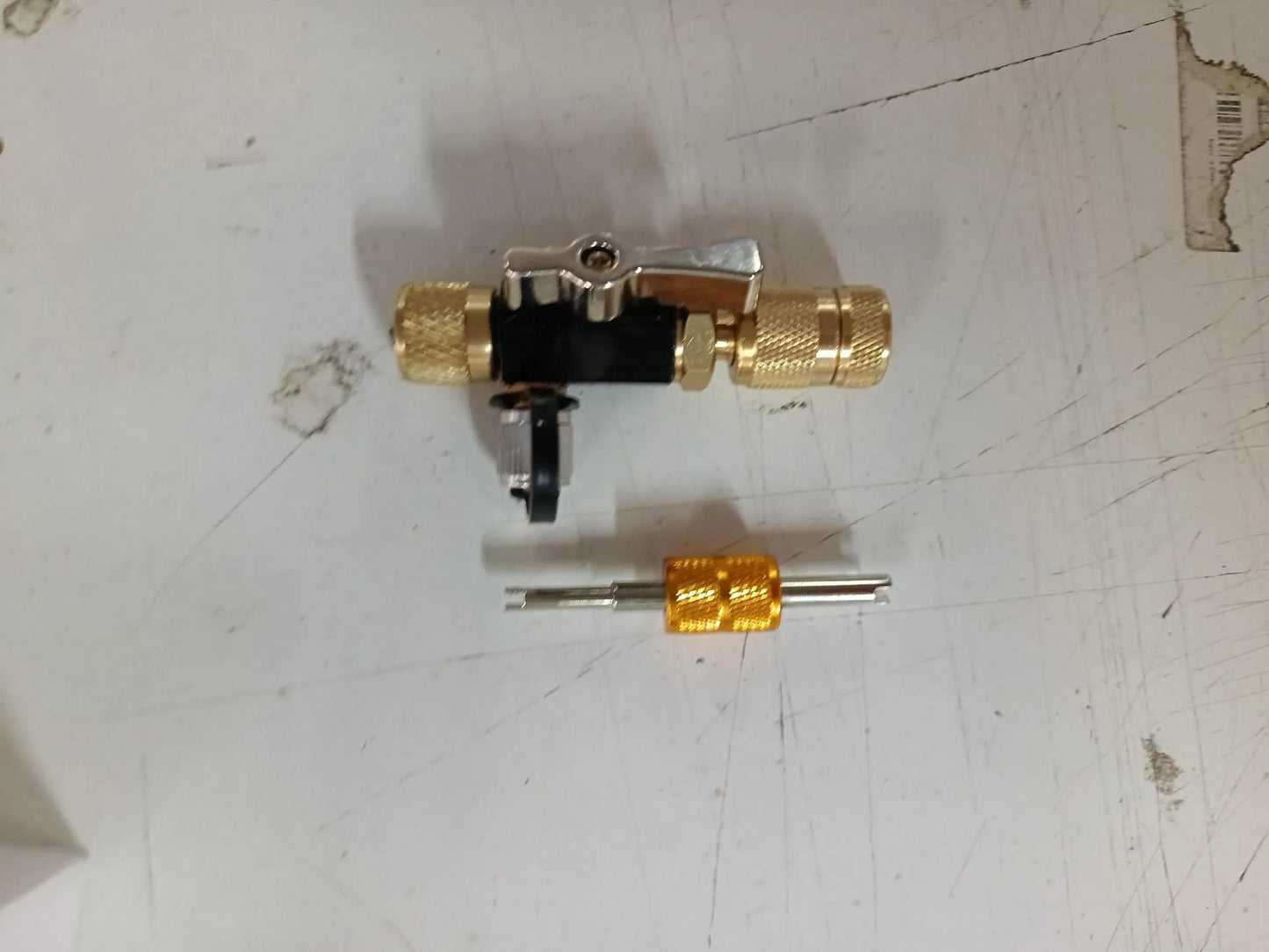 Vacuum valve core disassembly tool set with black and pink valve removers and wrench for tyre maintenance