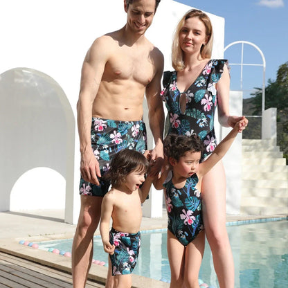 Parent and child matching quick-dry swim sets in green, pink, red colours with swimsuits and trunks