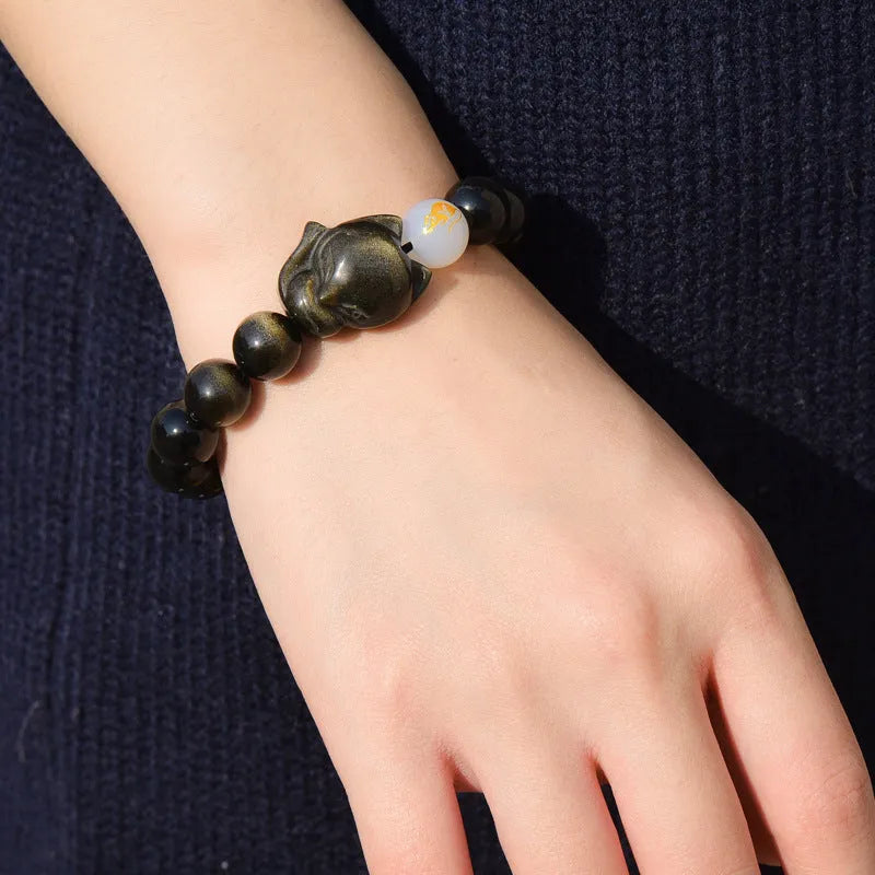 Natural obsidian beaded bracelet with 10mm stones in gold, silver, or black style.