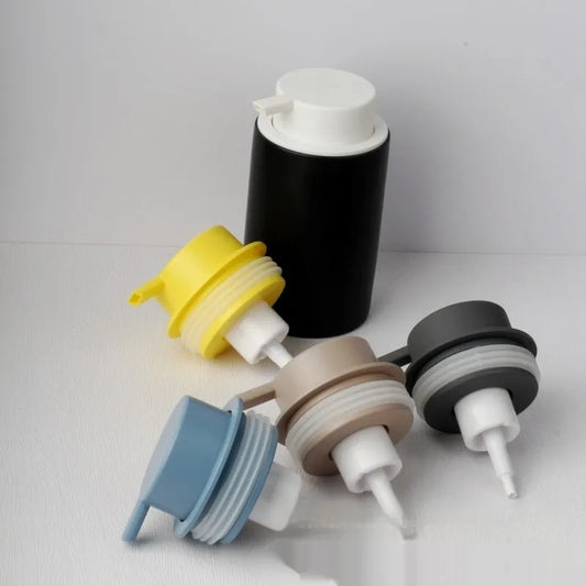 Facial cleanser foam pump with large head in ABS plastic, showing foaming function and finish options