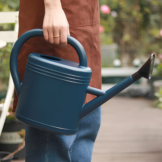 Large blue plastic watering kettle with 10-litre capacity and retro design for garden use
