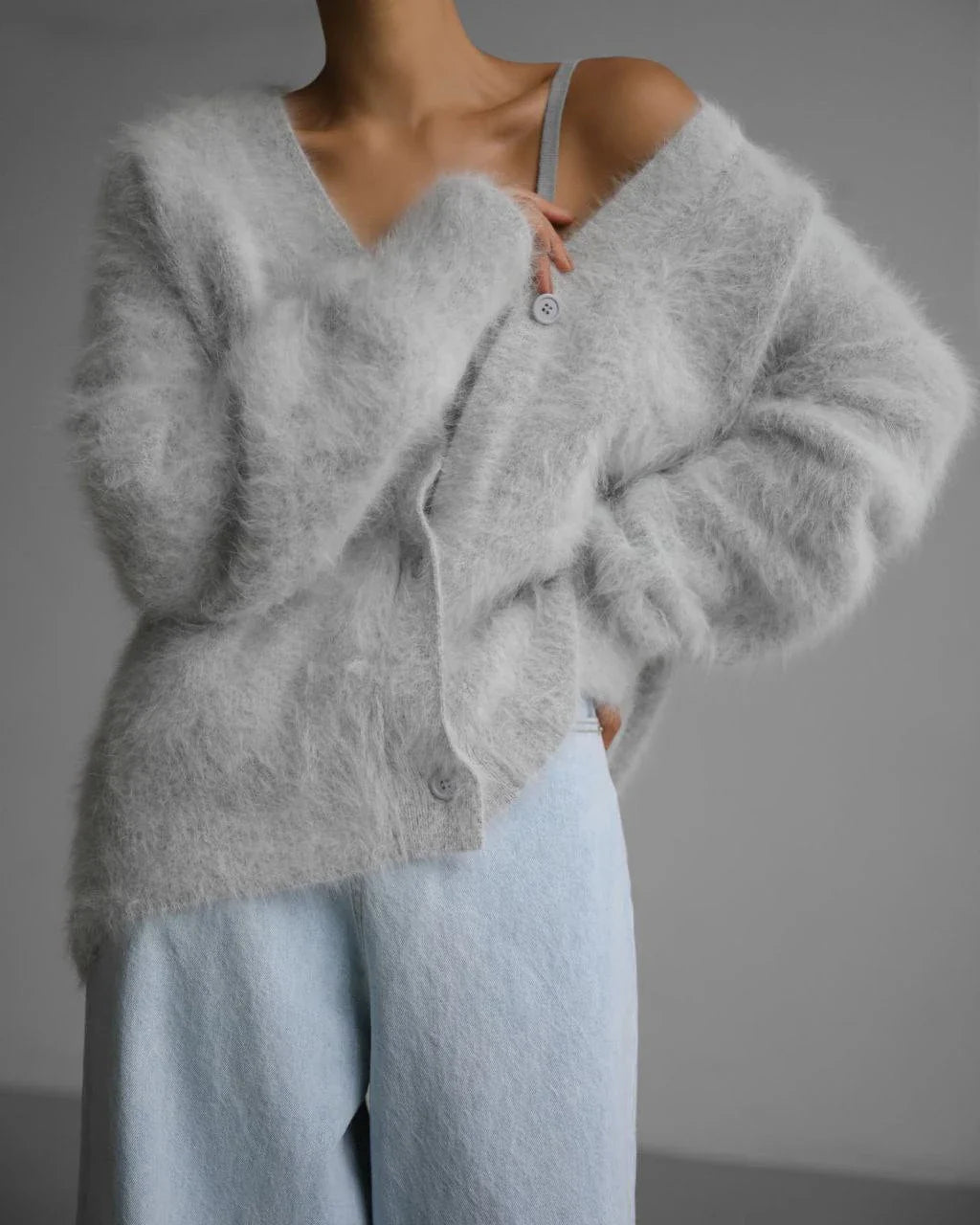 Cozy oversized cardigan with v-neck, button front, and variety of color options for women